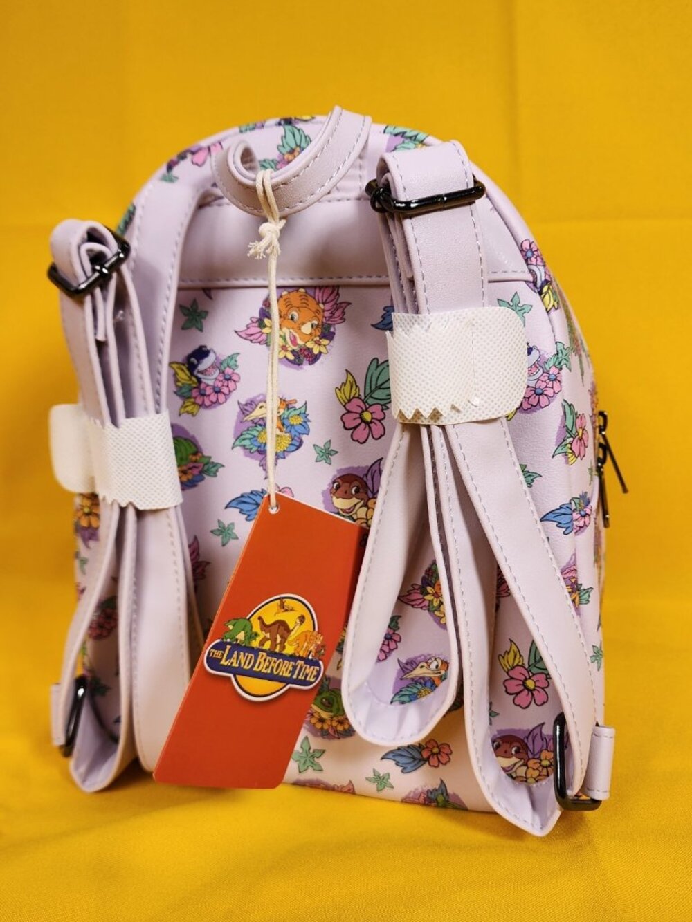 Loungefly The Land Before Time Dinosaurs Floral Purple Soft Tag Mini Backpack - Picture 5 of 11